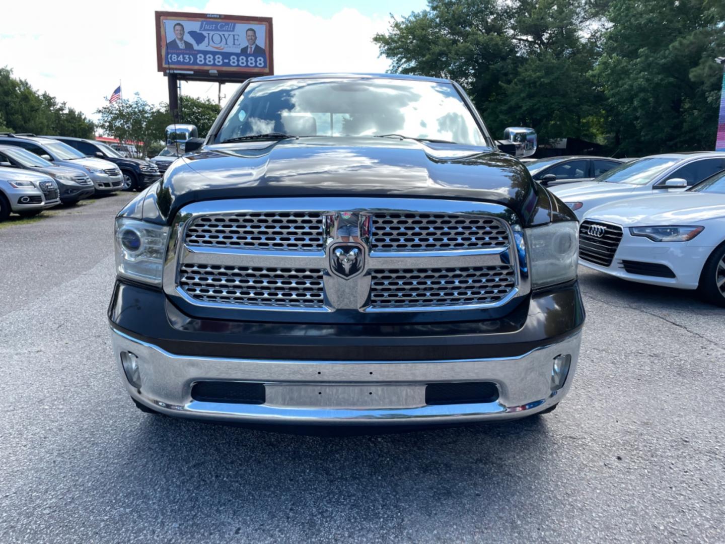 2013 BROWN RAM 1500 LARAMIE (1C6RR6NT8DS) with an 5.7L engine, Automatic transmission, located at 5103 Dorchester Rd., Charleston, SC, 29418-5607, (843) 767-1122, 36.245171, -115.228050 - Clean CarFax (no accidents reported!) Leather, Navigation, Backup Camera, CD/Sat/Bluetooth, Dual Climate Control, Power Everything (windows, locks, seats, mirrors), Heated/Cooled Seats, Heated Rear Seats, Heated Steering Wheel, Power Sliding Rear Window, Power Inverter, Push Button Start, Keyless E - Photo#1